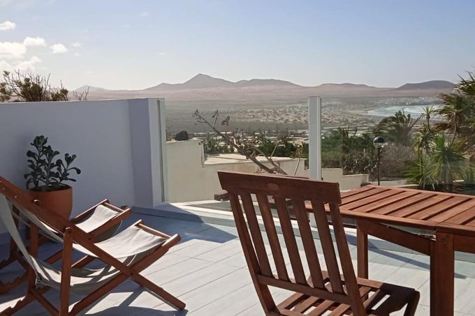 360 View to Ocean and Cliffs apartment Famara — panoramic terrace with volcanic cliffs and Atlantic Ocean views from Calle Bellas del Risco