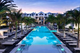 Barcelo Teguise Beach adults-only hotel infinity pool view — modern resort Costa Teguise Lanzarote