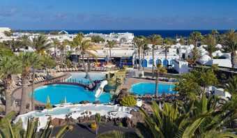 H10 Suites Lanzarote Gardens family resort pool area — two-bedroom suites near Playa de las Cucharas Costa Teguise