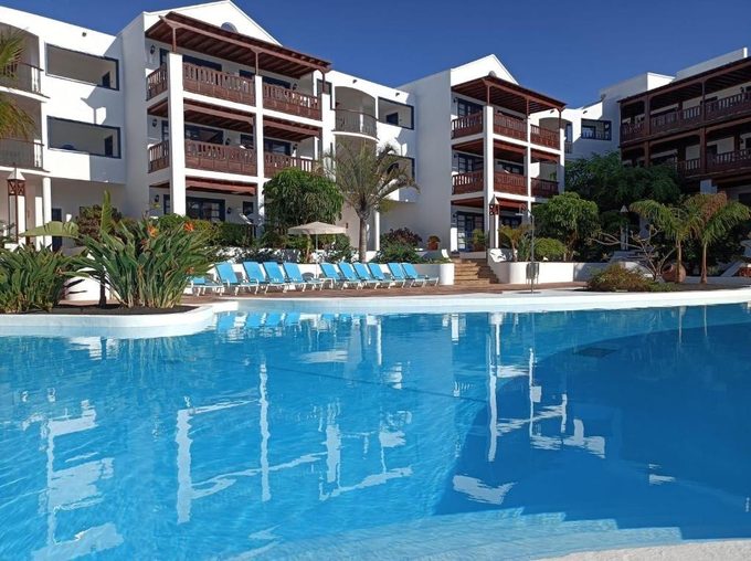 Nazaret Mansion Costa Teguise Lanzarote — Canarian-style apartment complex with whitewashed walls and tropical gardens
